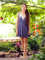 Connie portrays a sweet and cute garden nymph with her long, wavy brown hair, naturally beautiful face without any hint of makeup, and an exquisite body with womanly curves.